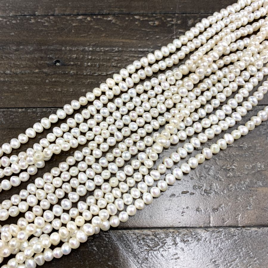 4/5mm Round Freshwater Pearls (White) (16 Strand)